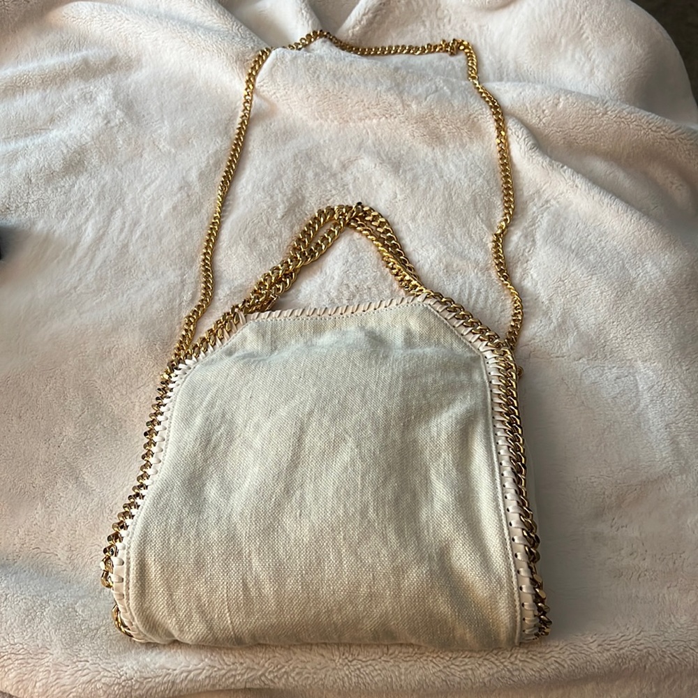 Stella McCartney linen and gold hats ware worn once